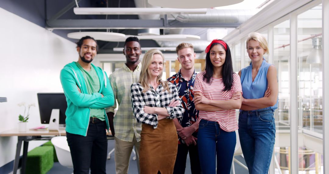 Diverse Team of Millennials Smiling in Modern Office - Free Images, Stock Photos and Pictures on Pikwizard.com