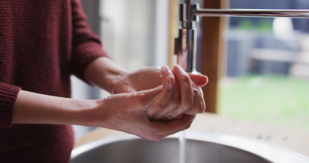 Individual Washing Hands Under Running Water for Hygiene - Free Images, Stock Photos and Pictures on Pikwizard.com