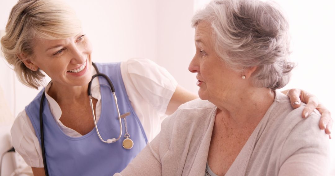 Healthcare Professional Comforting Elderly Woman - Free Images, Stock Photos and Pictures on Pikwizard.com