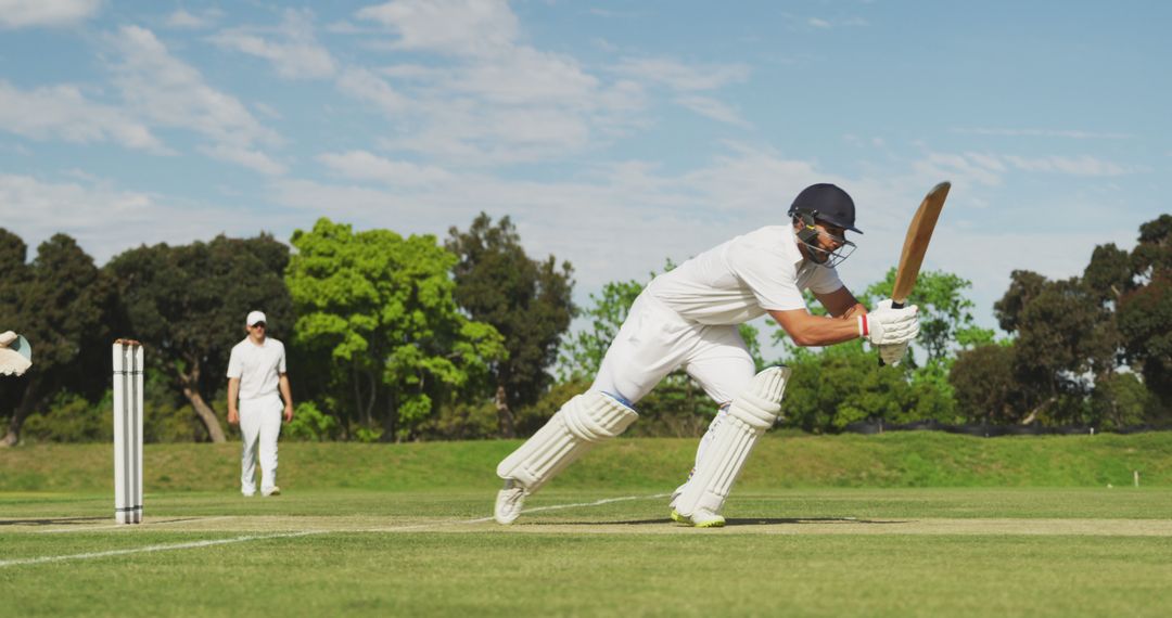 Cricket Player Striking the Ball During Match - Free Images, Stock Photos and Pictures on Pikwizard.com