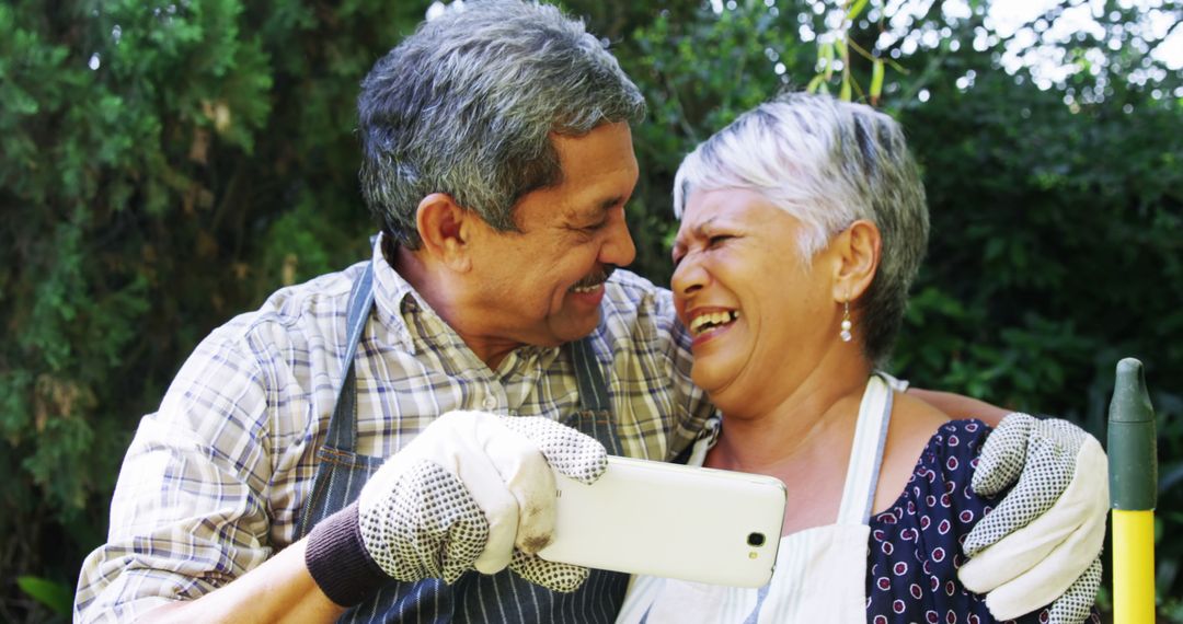 Joyful Latino Couple Taking Selfie in Garden