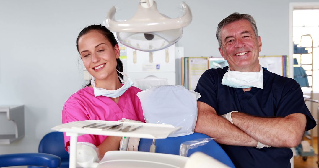 Happy Dental Professionals in Clinic - Free Images, Stock Photos and Pictures on Pikwizard.com