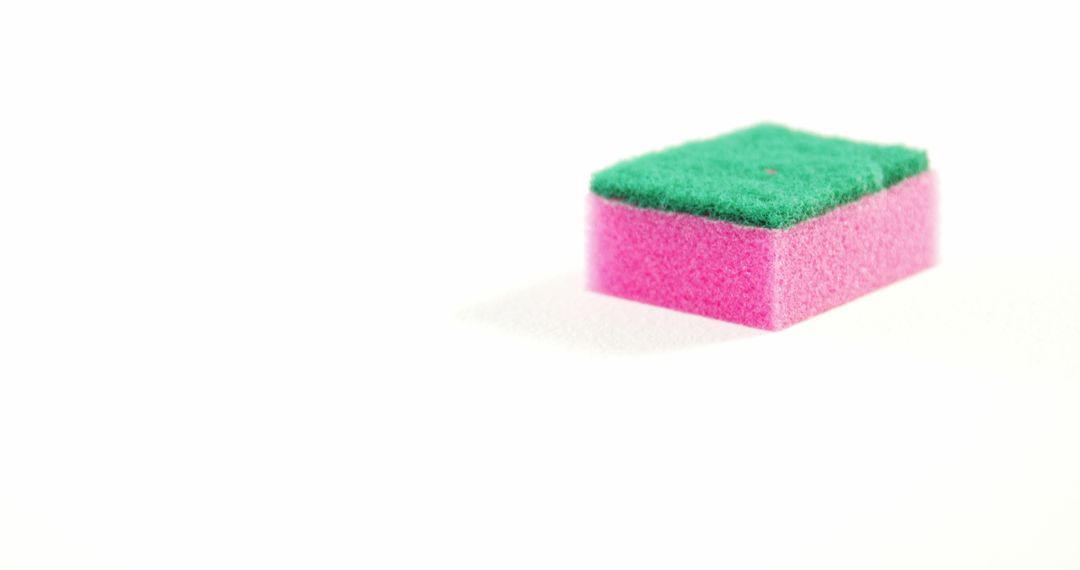 Colorful Cleaning Sponge on White Background for Housekeeping - Free Images, Stock Photos and Pictures on Pikwizard.com