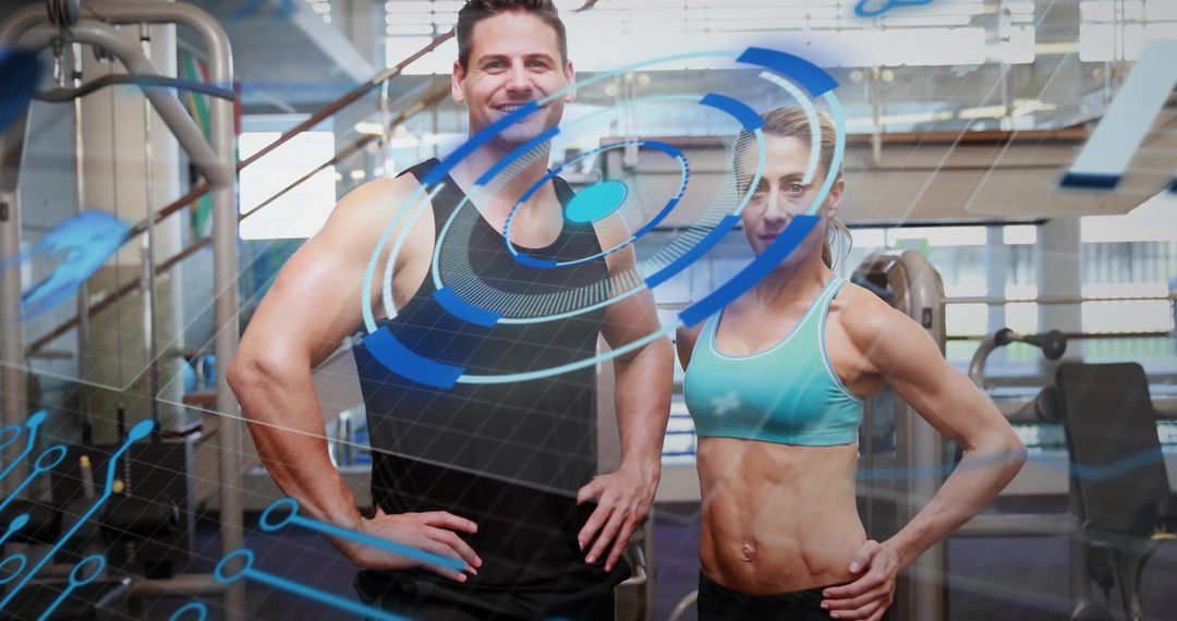 Fit couple posing hands-on-hips in gym with blue HUD overlay for digital fitness branding