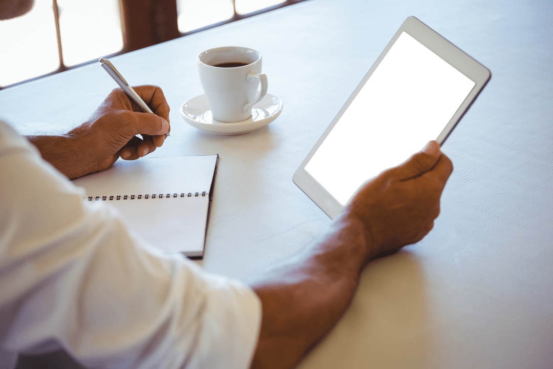 Professional Man Using Digital Tablet in Bright Cafe with Transparent Background
