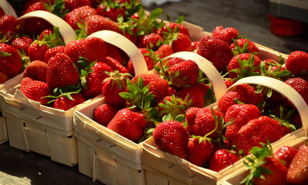 Freshly Harvested Strawberries in Wooden Baskets at Farmers Market - Free Images, Stock Photos and Pictures on Pikwizard.com