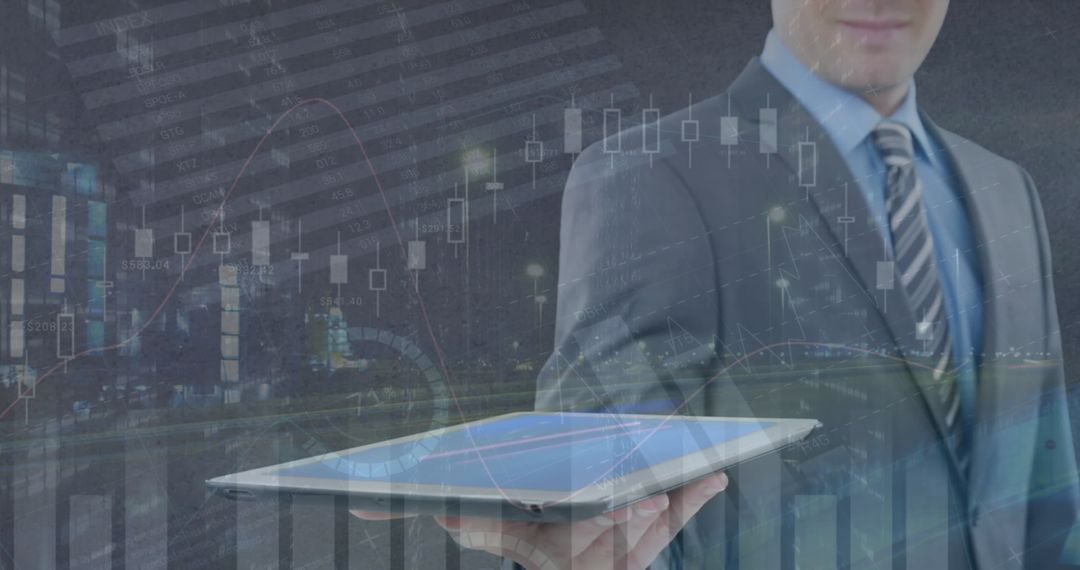 Businessman Holding Tablet with Financial Graphs Overlay