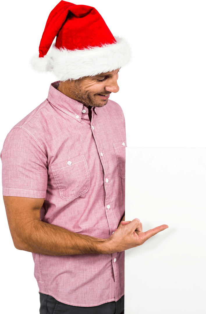 Man in Santa Hat Pointing at Transparent Sign Isolated