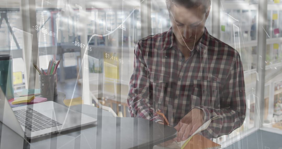 Focused Professional Analyzing Financial Data at Modern Office Desk