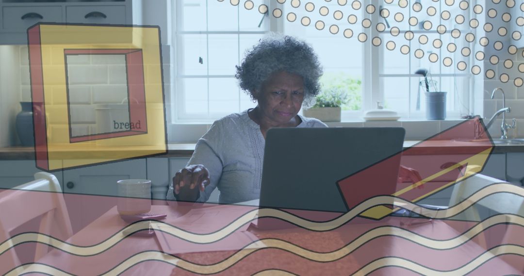 Senior African American Woman Engaging with Digital Interface at Home