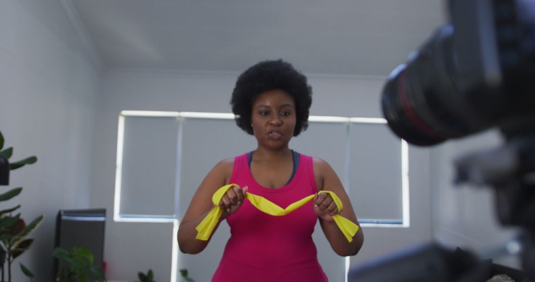 Plus Size Woman Recording Workout Tutorial at Home