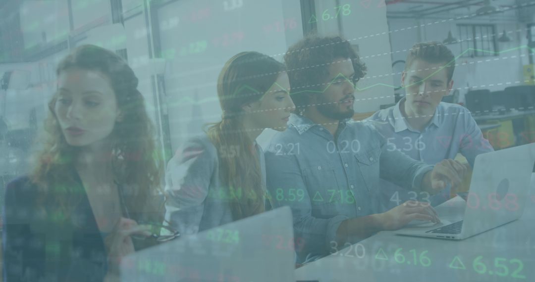 Team Analyzing Financial Data on Laptops in Modern Office