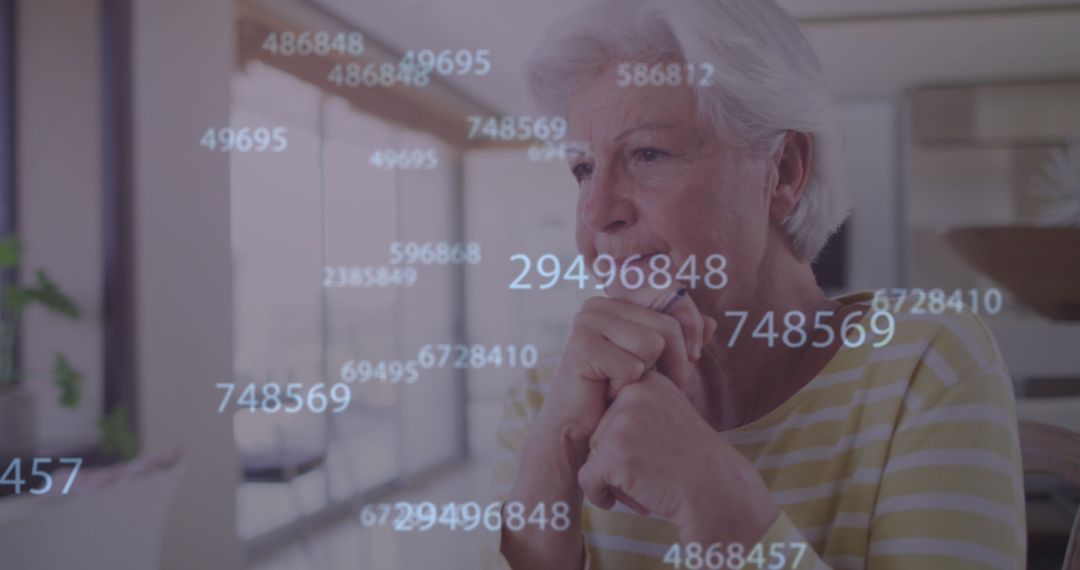 Contemplative Senior Woman Engaging with Virtual Data at Home