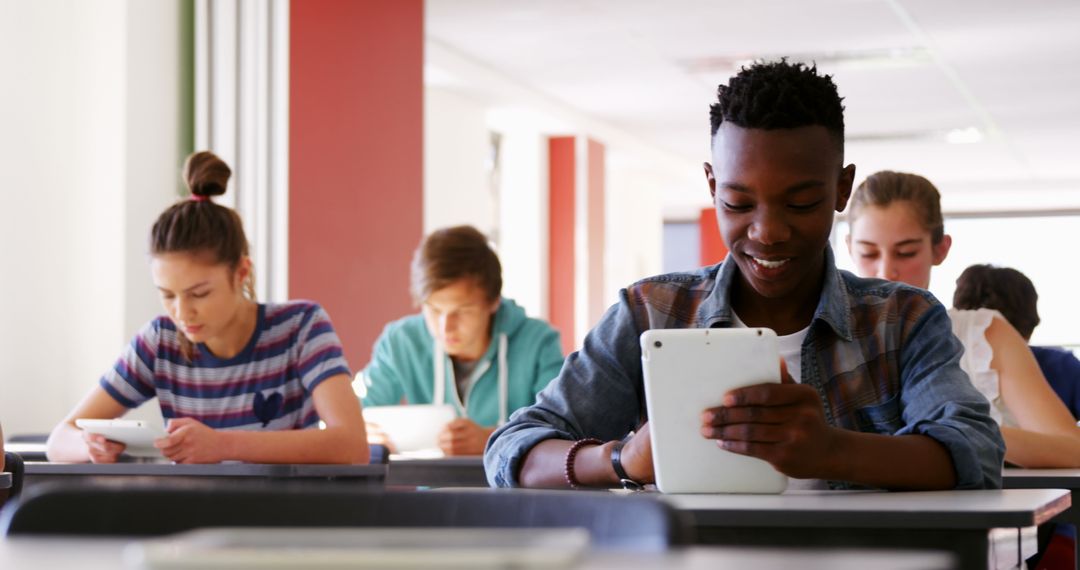 Students Using Digital Tablets in Modern Classroom