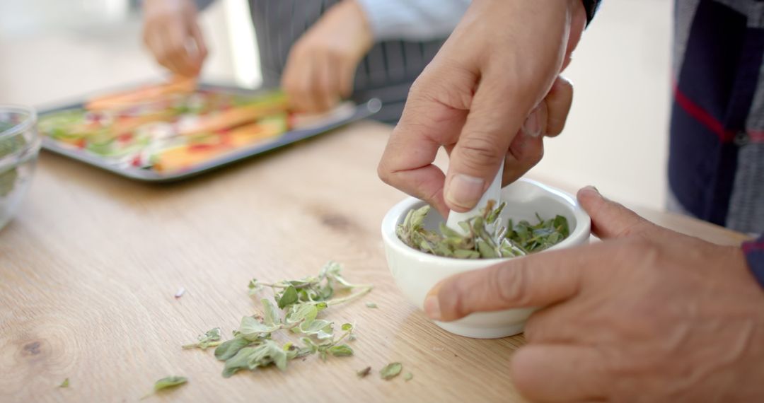 Preparing Fresh Herbs for Cooking in Modern Kitchen - Free Images, Stock Photos and Pictures on Pikwizard.com