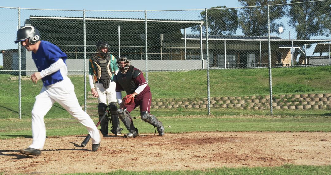 Baseball Player Sprinting from Home Plate During Game