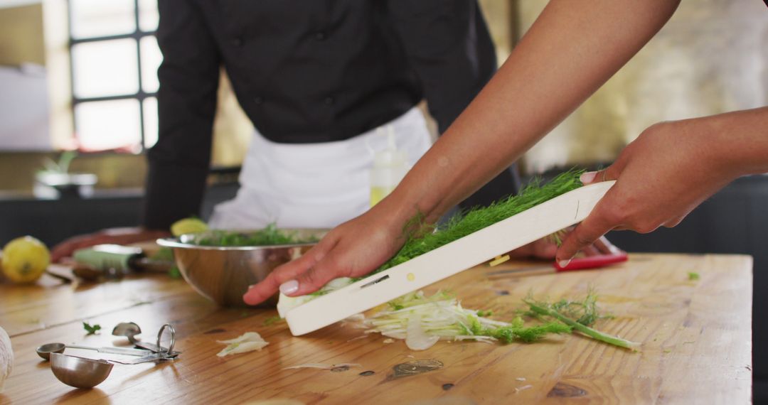 Close Up of Chef Slicing Vegetables in Professional Kitchen - Free Images, Stock Photos and Pictures on Pikwizard.com