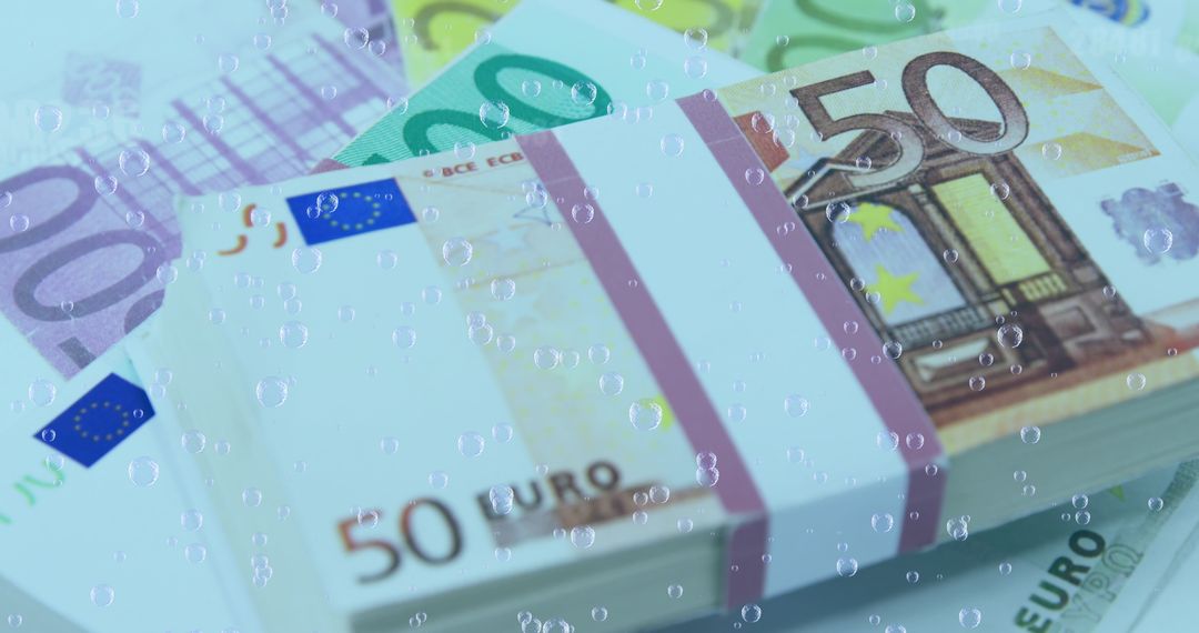 Stacks of Euro Currency with Numbers and Bubbles Overlay