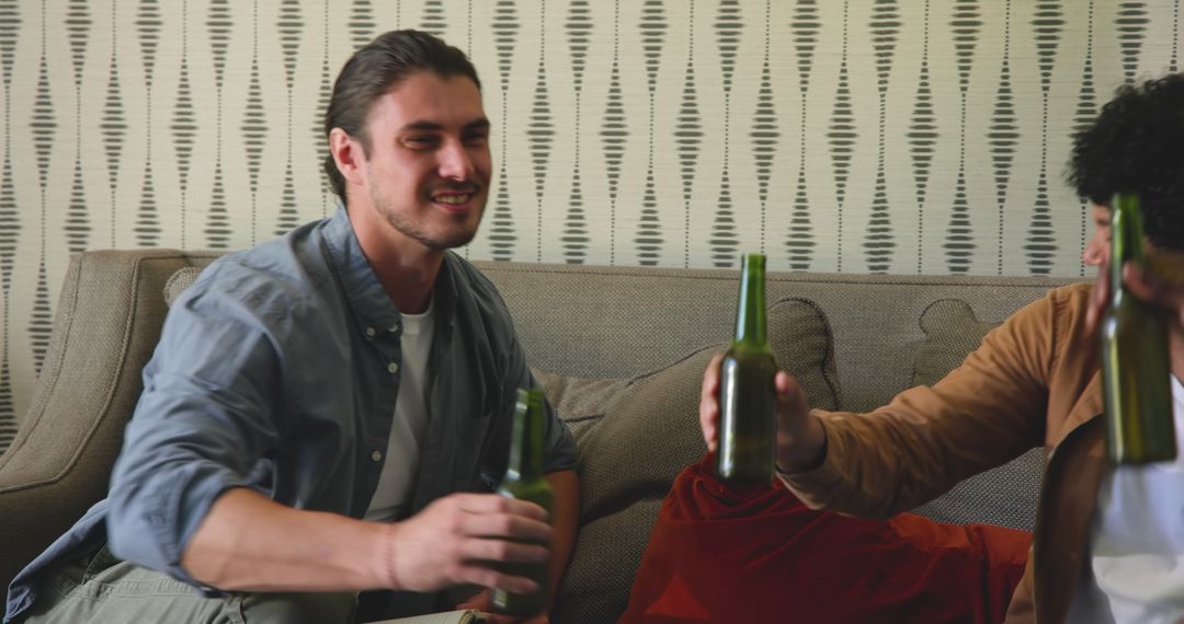 Friends Relaxing with Drinks at Home, Enjoying Company