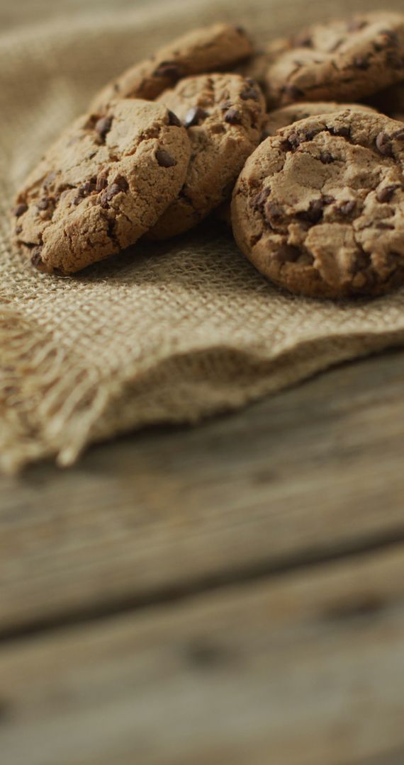 Chocolate Chip Cookies on Rustic Wooden Table and Burlap