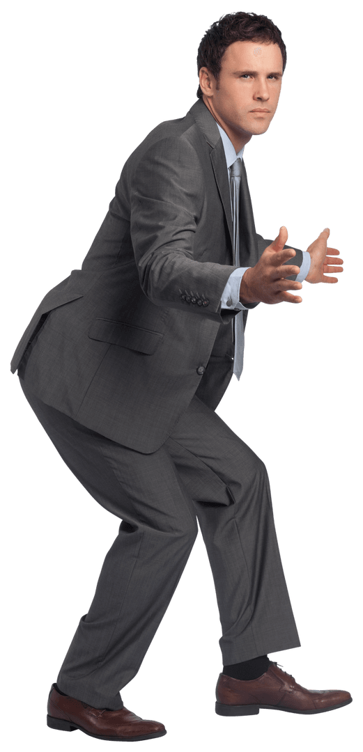 Businessman in Dynamic Pose with Arms Held Forward on Transparent Background