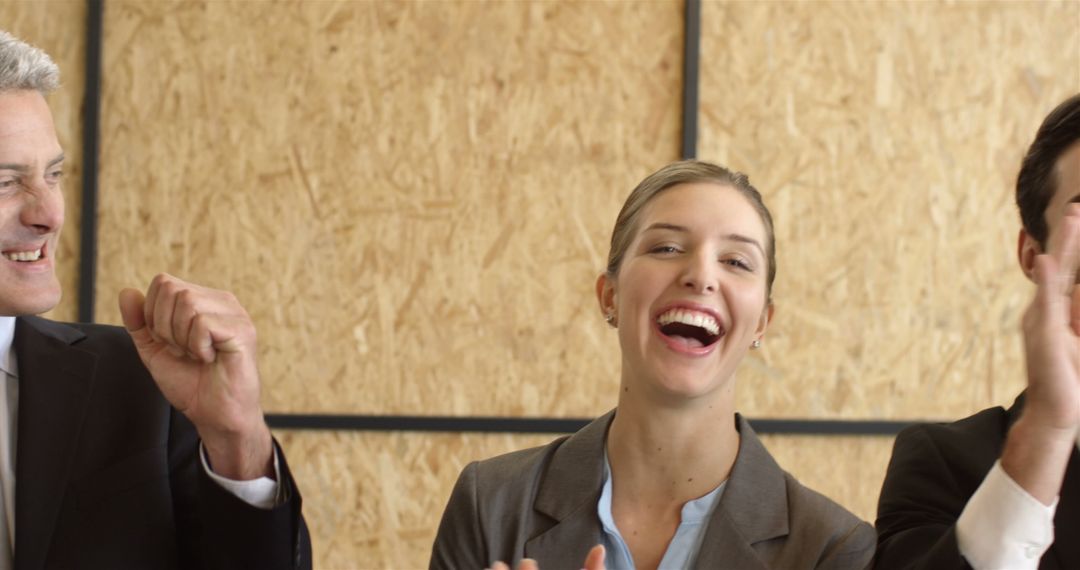 Group of Happy Professionals Celebrating Success - Free Images, Stock Photos and Pictures on Pikwizard.com