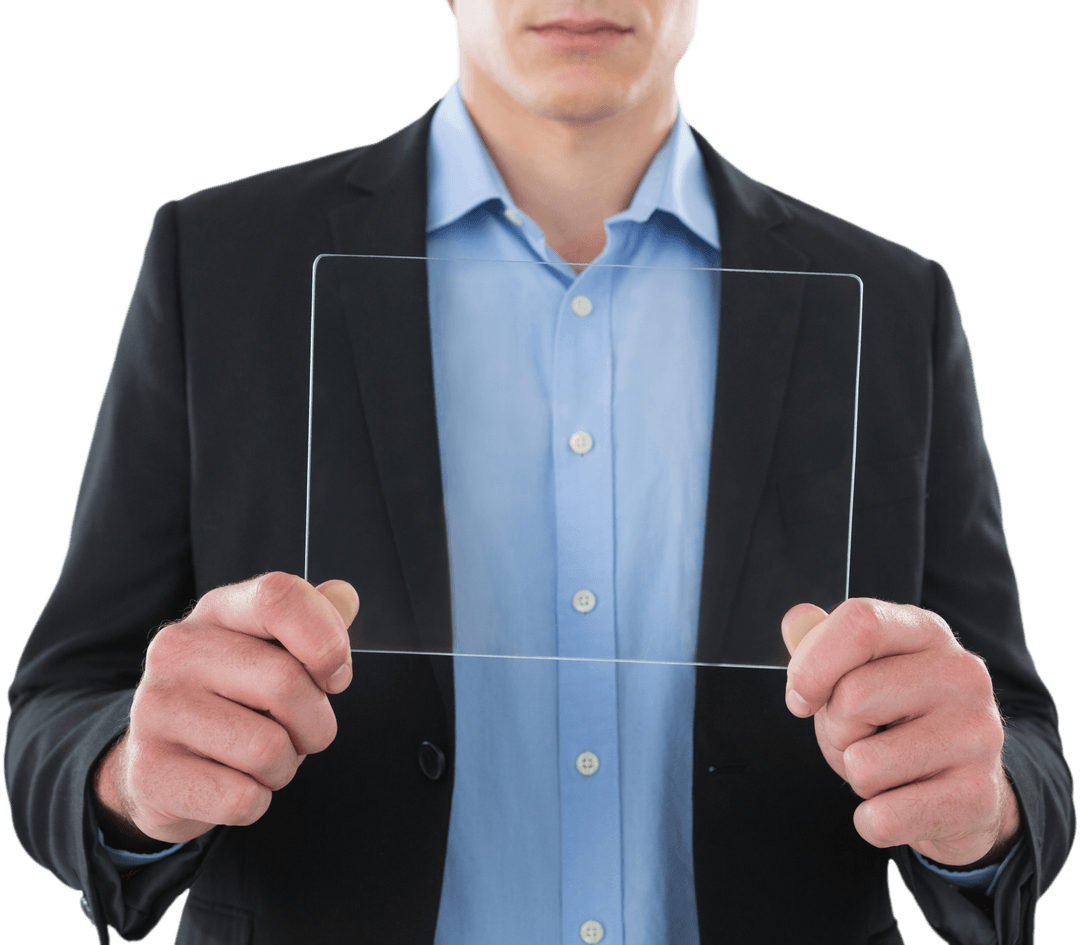 Businessman Holding Transparent Glass Interface with Focus on Innovation