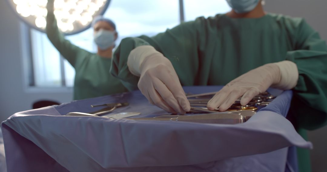 Surgeon Preparing Instruments in Operating Room for Surgery