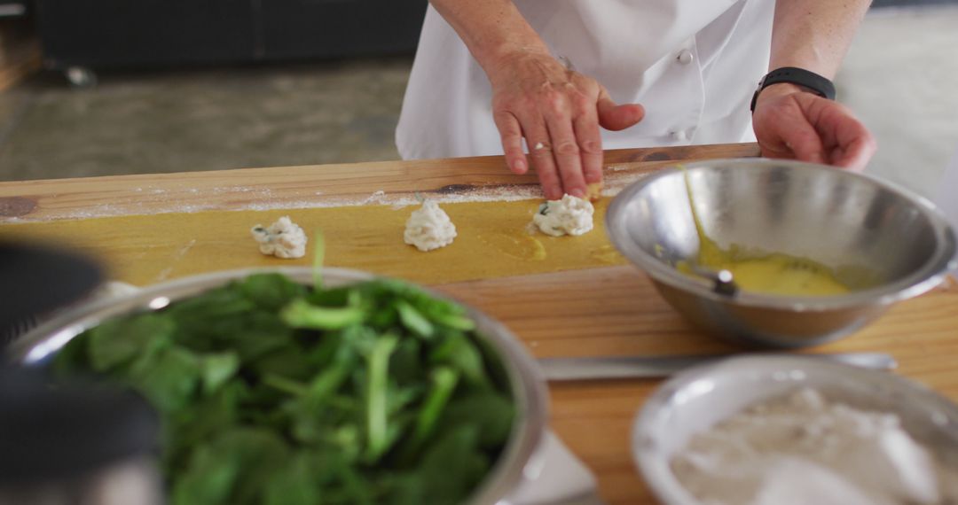 Chef Preparing Fresh Ravioli with Spinach and Cheese Filling - Free Images, Stock Photos and Pictures on Pikwizard.com