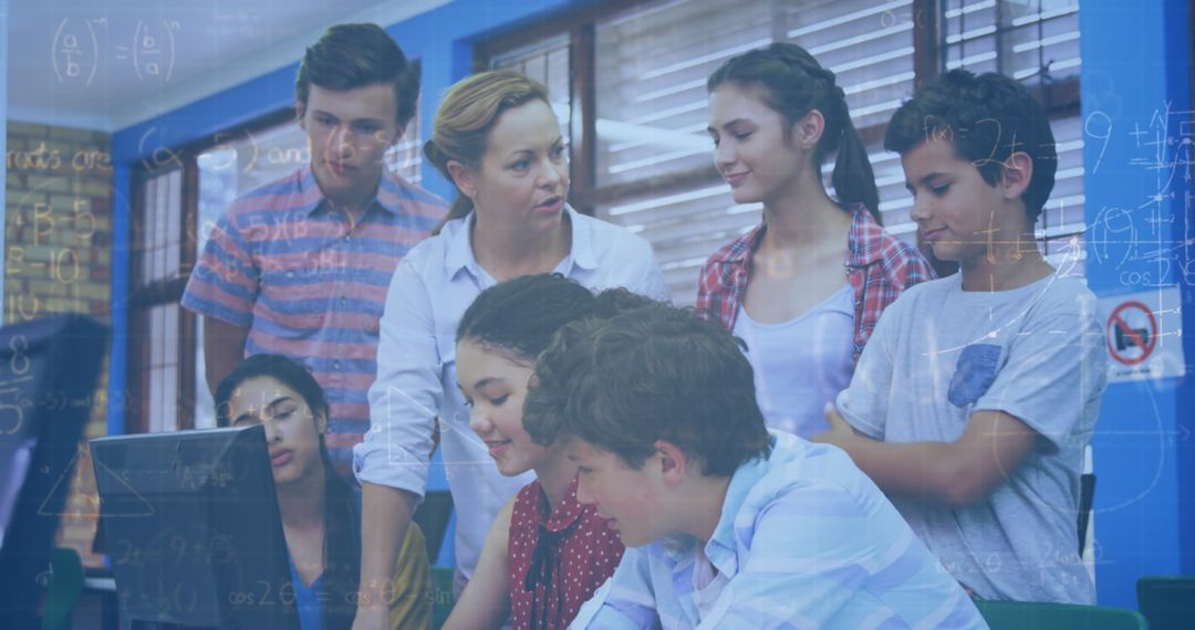 Teacher Guiding Engaged Students Using Technology in Classroom Setting