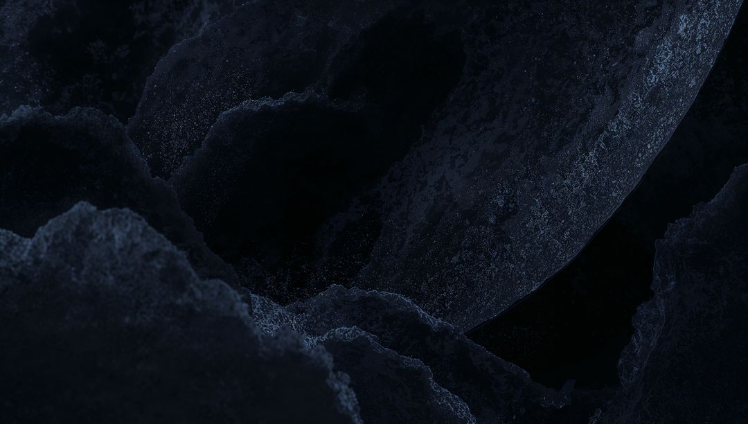 Revealing Dark Mineral Sphere and Granular Rock Macro Closeup with Cavernous Texture