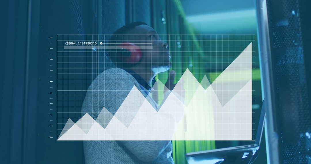 Technician Analyzing Data Trends in Modern Server Room