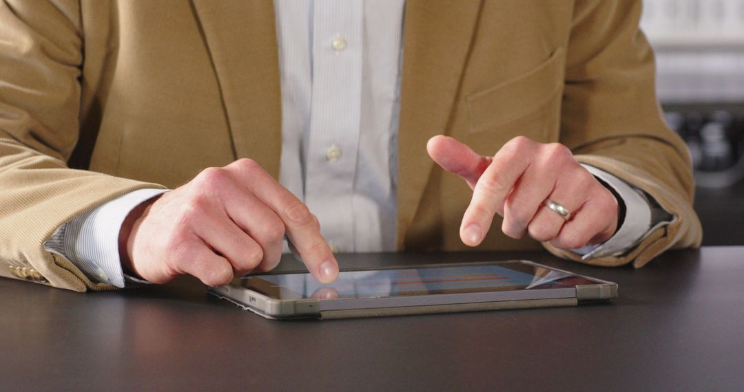 Business Professional Using Tablet for Office Work