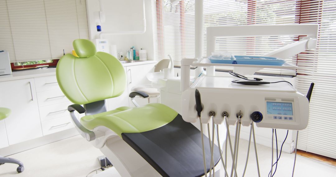 Modern Dental Clinic Interior with Green Chair - Free Images, Stock Photos and Pictures on Pikwizard.com