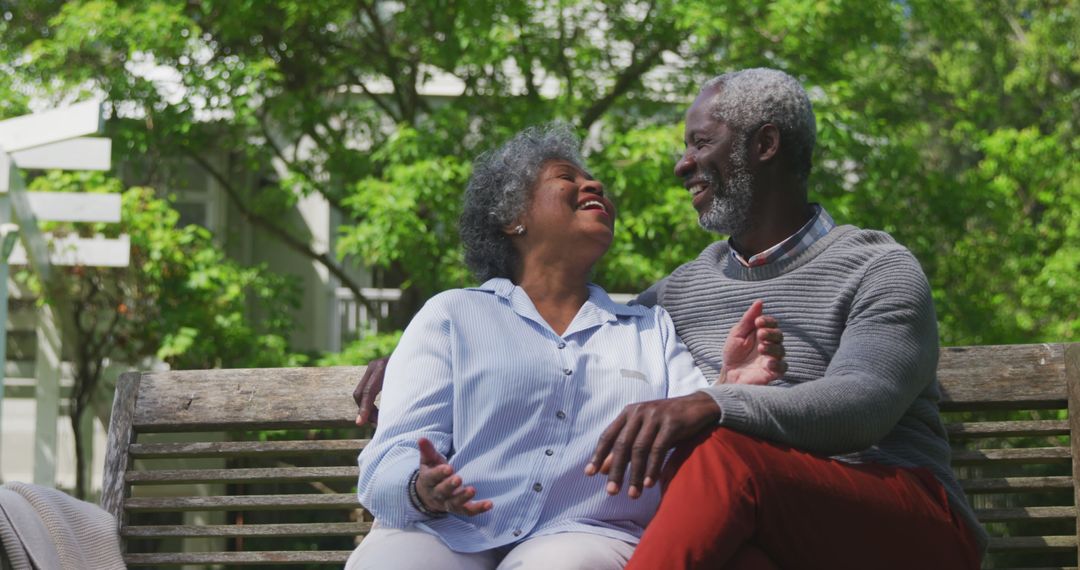 Senior African American Couple Laughing and Enjoying Outdoor Time Together - Free Images, Stock Photos and Pictures on Pikwizard.com