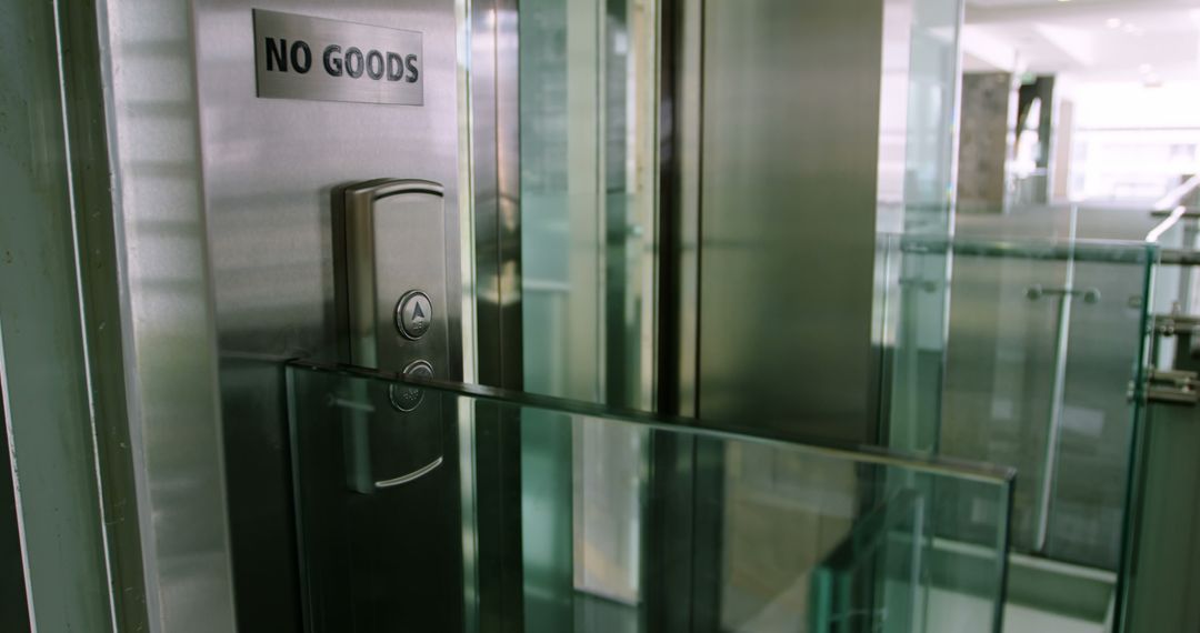 Modern Glass Elevator with Freight Restriction - Free Images, Stock Photos and Pictures on Pikwizard.com