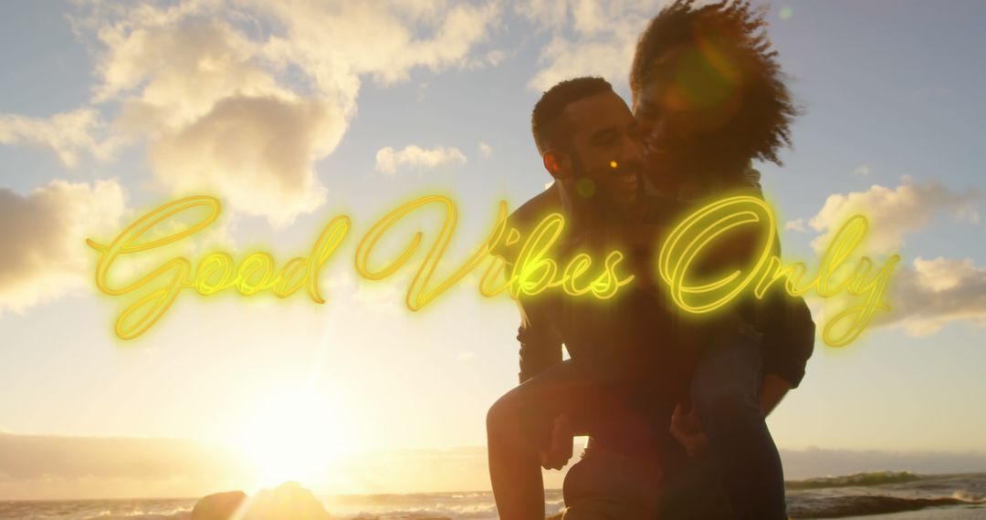 Couple Enjoying Sunset by the Seaside with Positive Message