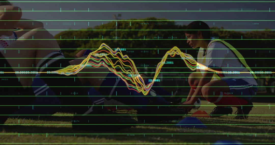 Athletic Preparation on Soccer Field with Overlaid Data Visualization