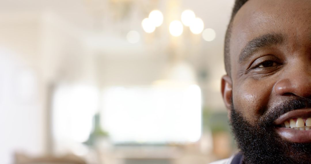 Close-Up of Smiling African American Man with Blurred Background