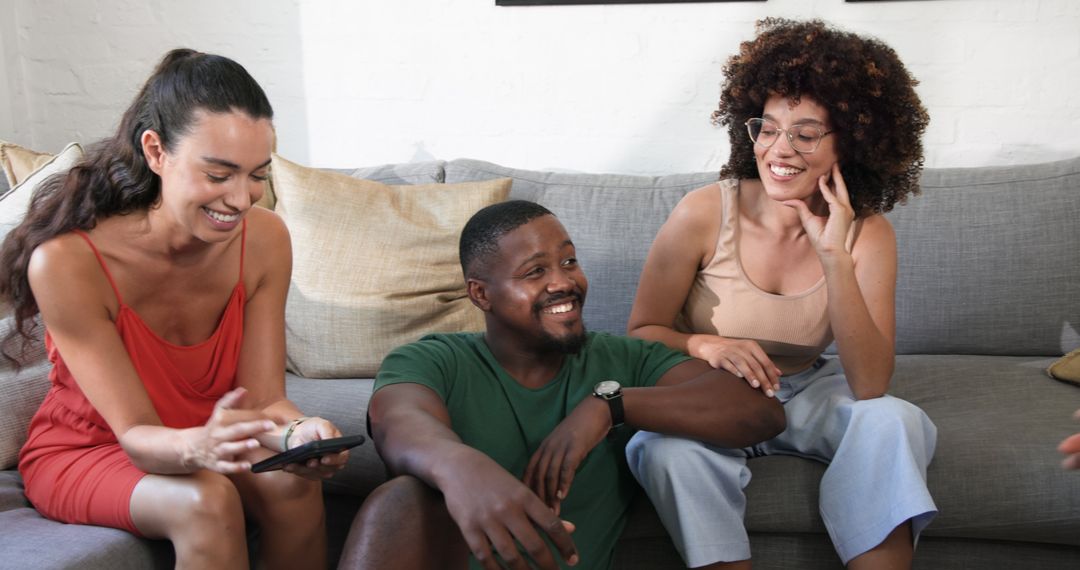 Diverse Friends Enjoying Time Together with Tablet Device on Couple