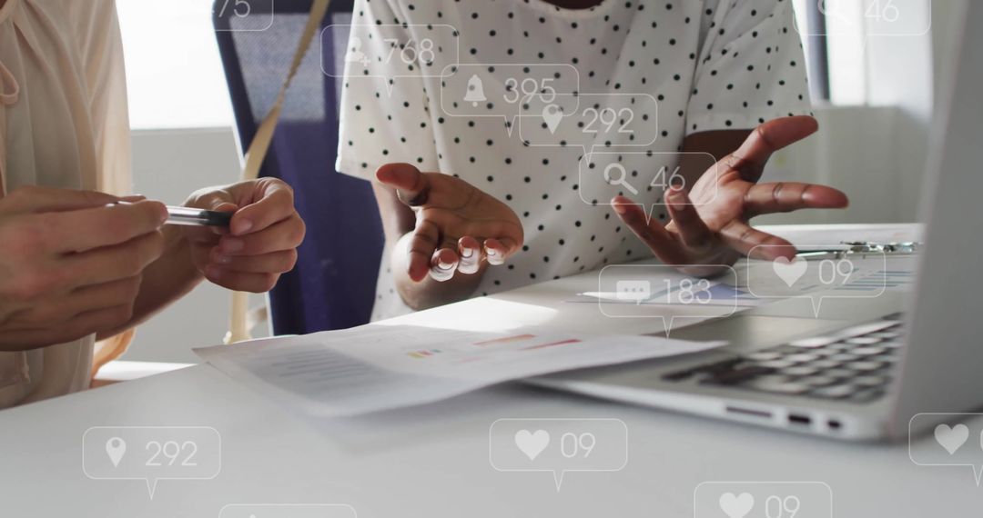 Diverse Business Team Discussing Data Analytics in Office Environment