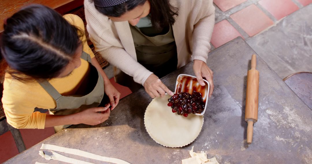 Student and Mentor Preparing Cherry Pie in Rustic Kitchen Setting