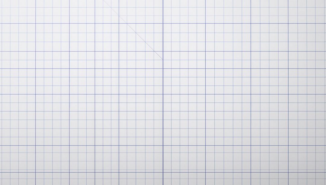 Showing white graph paper with light-blue grid, central fold crease, minimal geometry