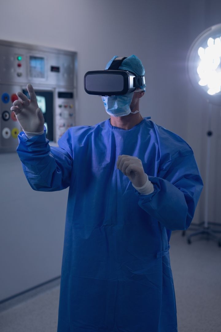 Male surgeon using virtual reality headset in operating room - Free Images, Stock Photos and Pictures on Pikwizard.com
