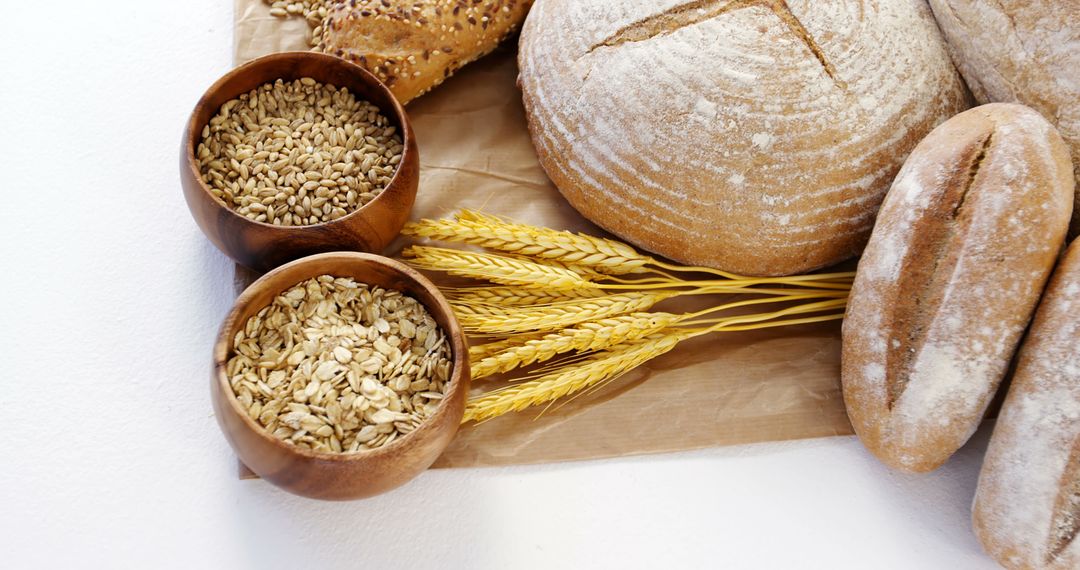 Freshly Baked Bread with Grains and Wheat - Free Images, Stock Photos and Pictures on Pikwizard.com