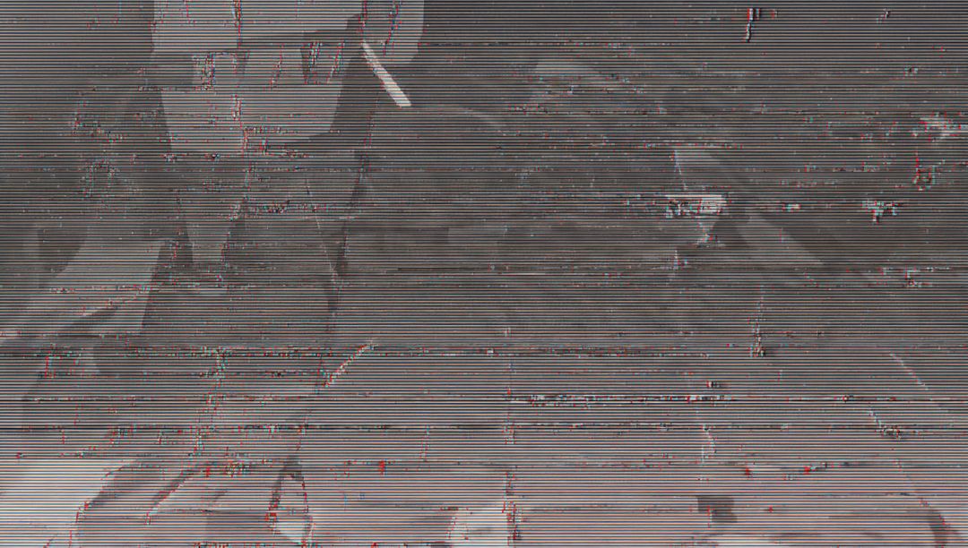 Standing silhouette on tiled floor with horizontal glitch lines and grainy grayscale