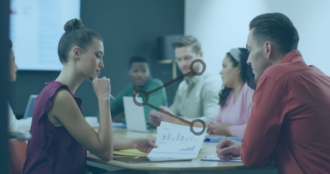 Diverse Team Collaborating in Office with Share Icon Overlay