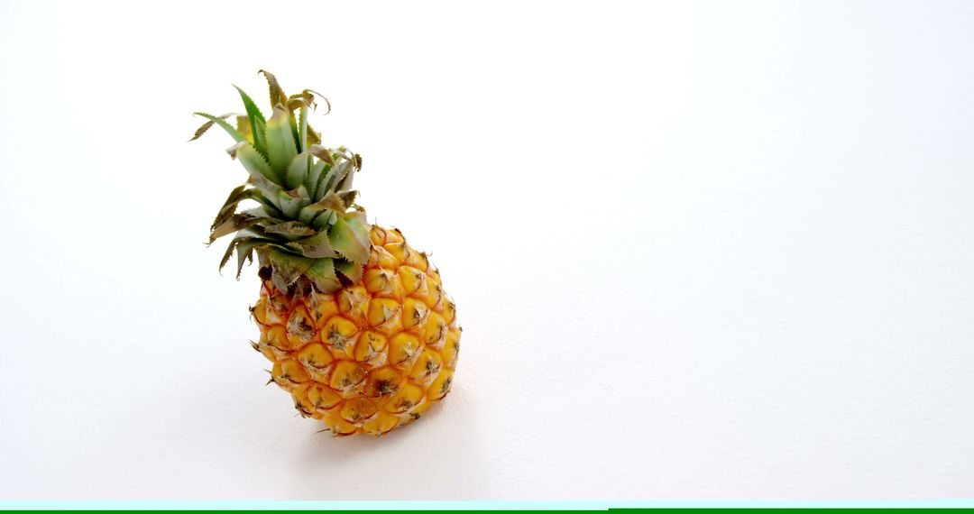 Ripe Pineapple on White Background - Free Images, Stock Photos and Pictures on Pikwizard.com