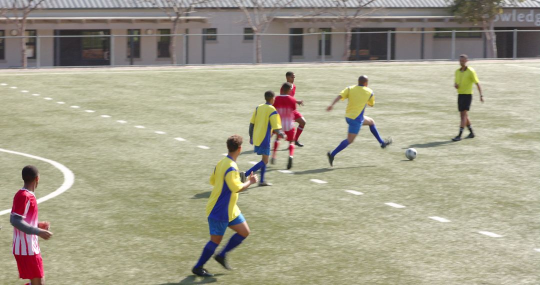 Intense Soccer Match Focus on Team Strategy