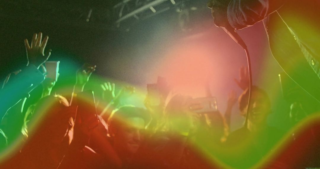 Energetic Concert Scene with Vibrant Stage Effects